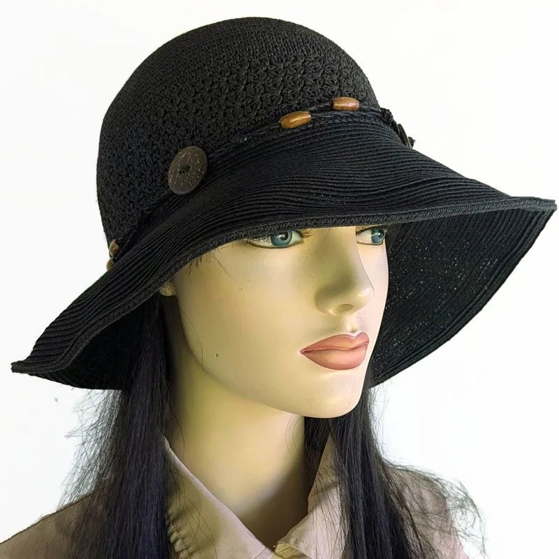 Sun Hat, Straw Packable black straw hat with button trim and lovely crochet textures, wired brim edge, adjustable fit